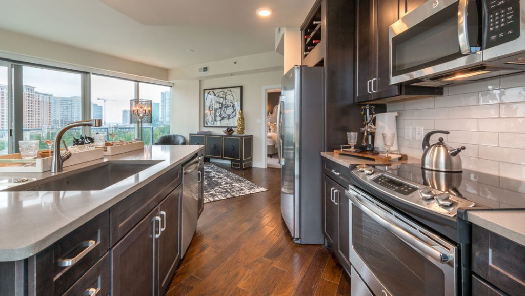 One Uptown Al Coker & Associates